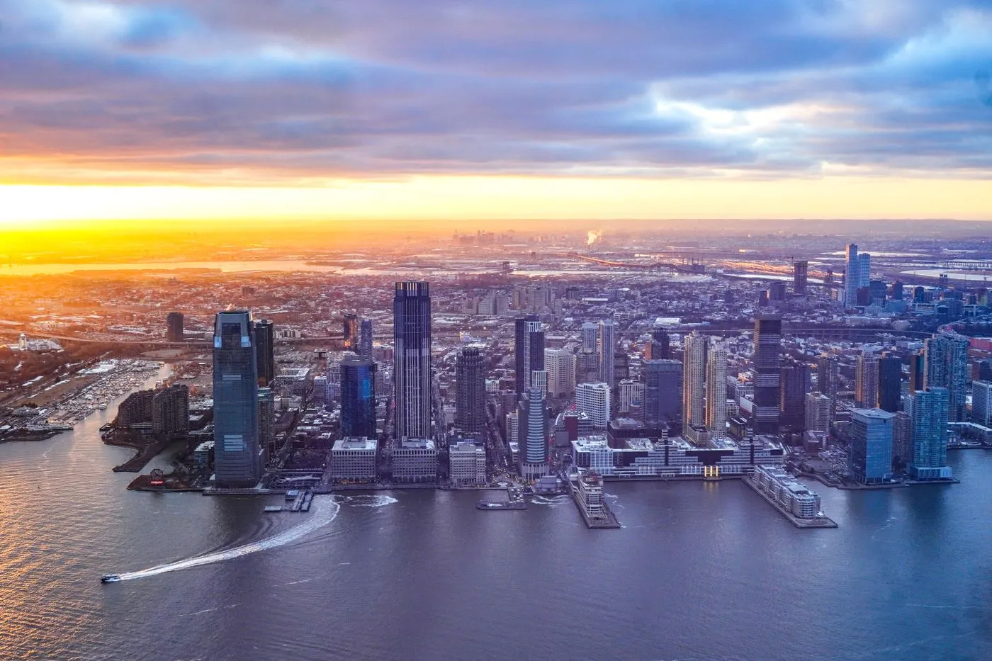 Jersey City waterfront skyline on the Hudson River at sunset