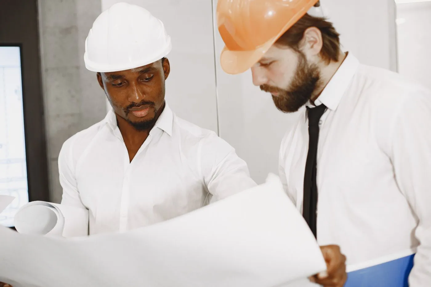 Two estimators reviewing a drawing set