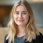 professional portrait of a smiling young british woman ideal for business marketing and corporate promotions photo e1751284188447